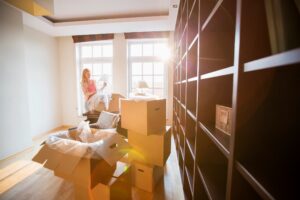 Woman packing items in boxes